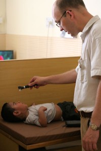 Doctor examining a child
