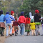 Latika Roy Foundation Row of children, seen from behind - one has CP