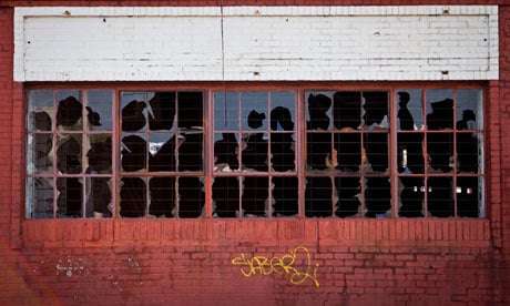 Broken windows on an old brick factory